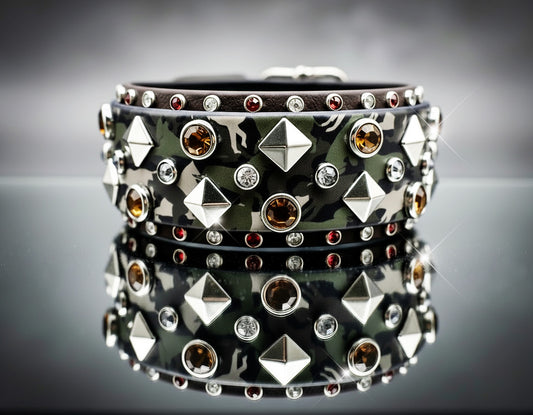 camouflage-patterned dog collar with studded details on a reflective surface.